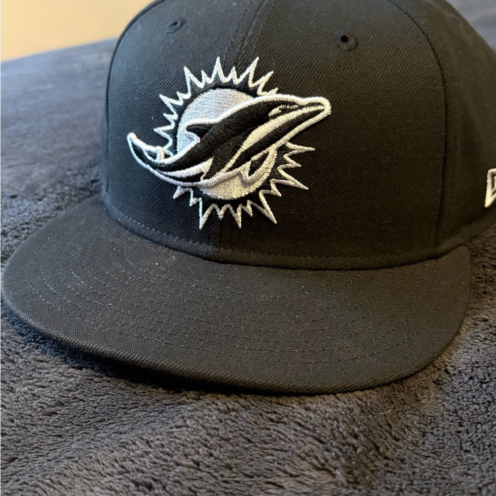 New Era Black Miami dolphins hat.